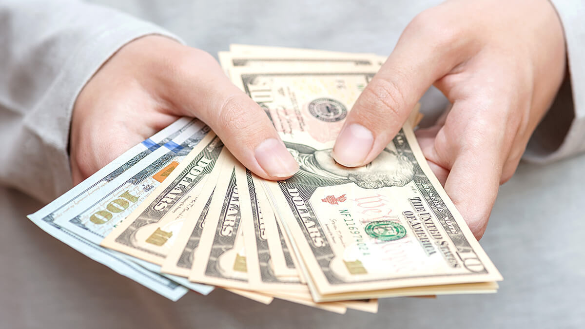 Arrangement of cash fanned out