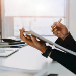Man reviewing allowable business expenses.