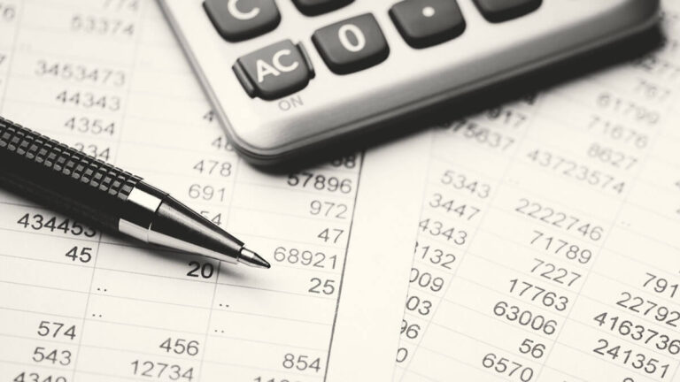 Calculator on top of financial statements.