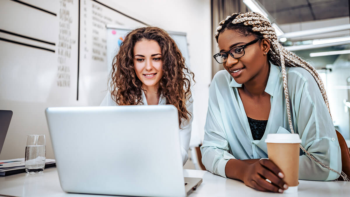 Two women filing an amended tax return.