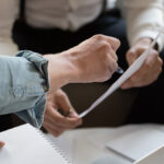 Business owner filling out a small business credit application.