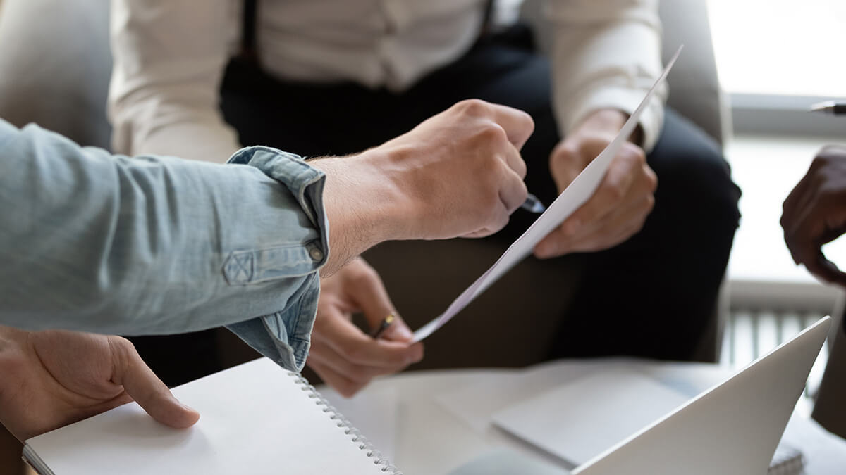 Business owner filling out a small business credit application.