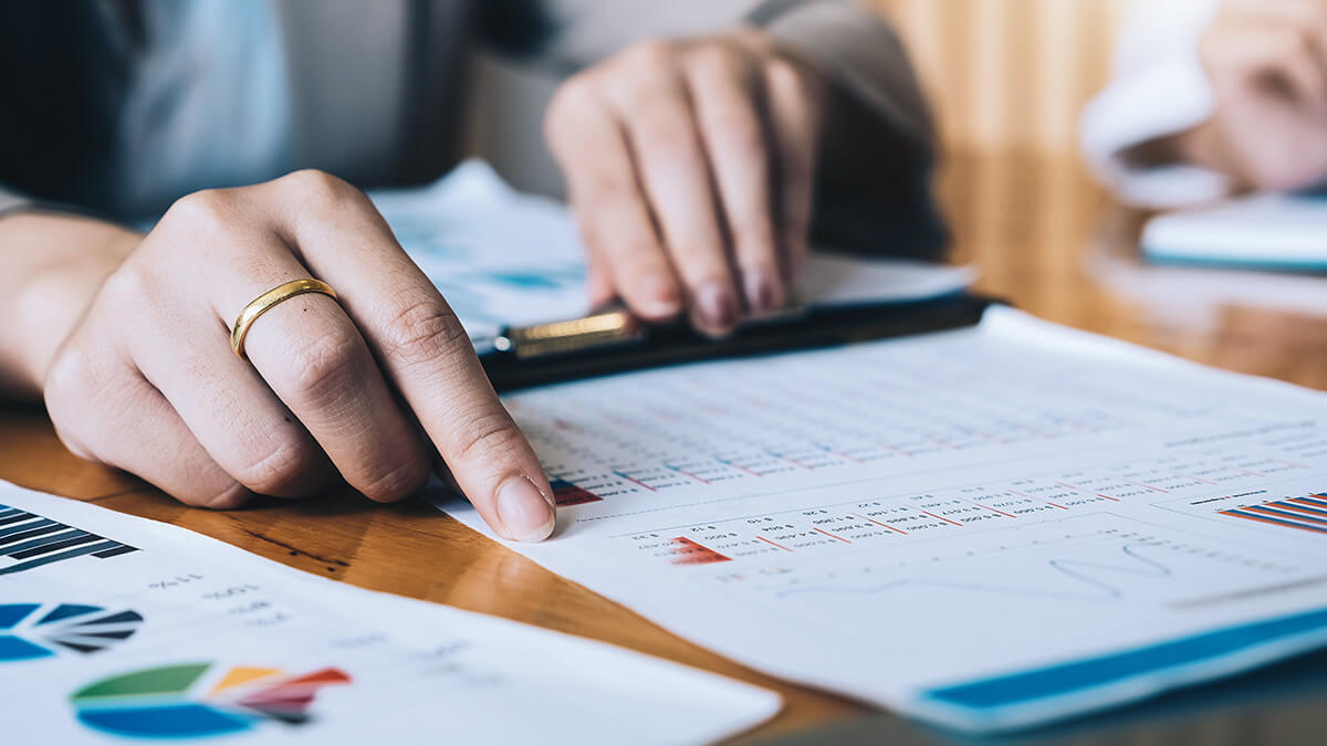 Woman reviewing cash flow statement.
