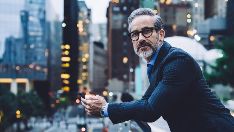 Man overlooking city.