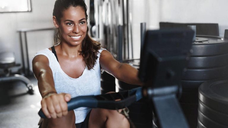 Woman exercising in a gym.
