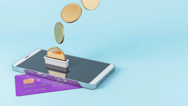 Purple credit card, phone, and coins on a blue background.
