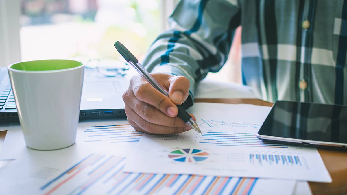 Man working on double-entry accounting