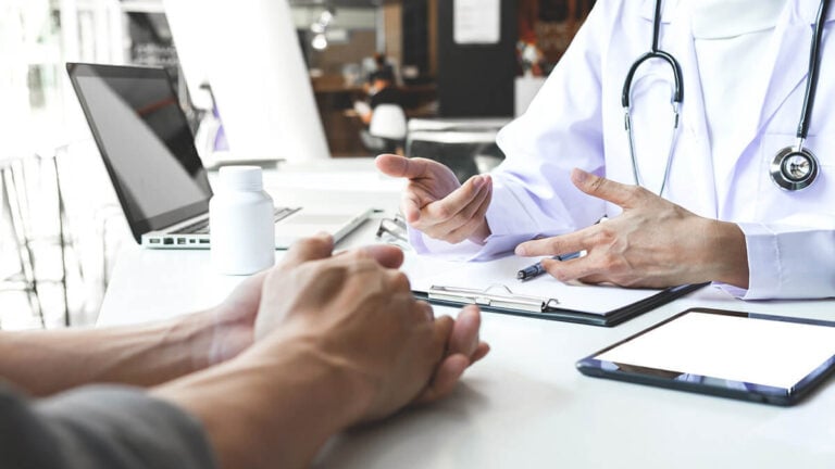 Patient speaking with their doctor.