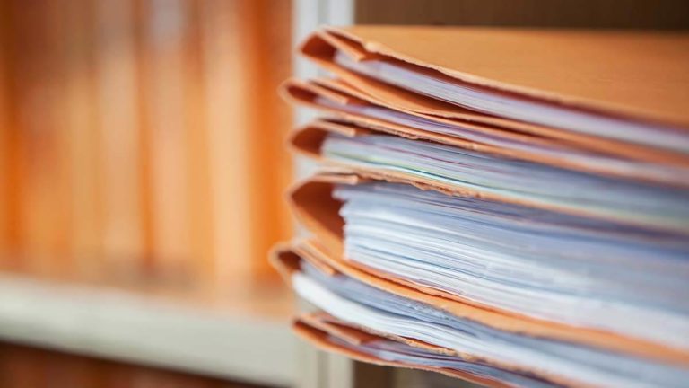 Orange folders stacked.