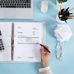 Calculator and an invoice.