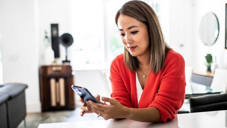 Woman using a cell phone.