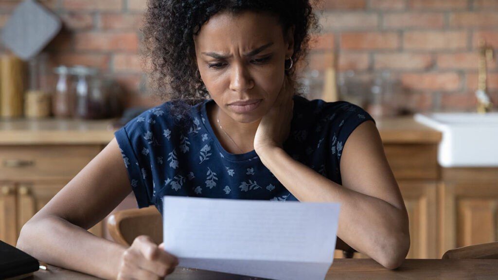 Woman trying to figure out bad debt recovery.