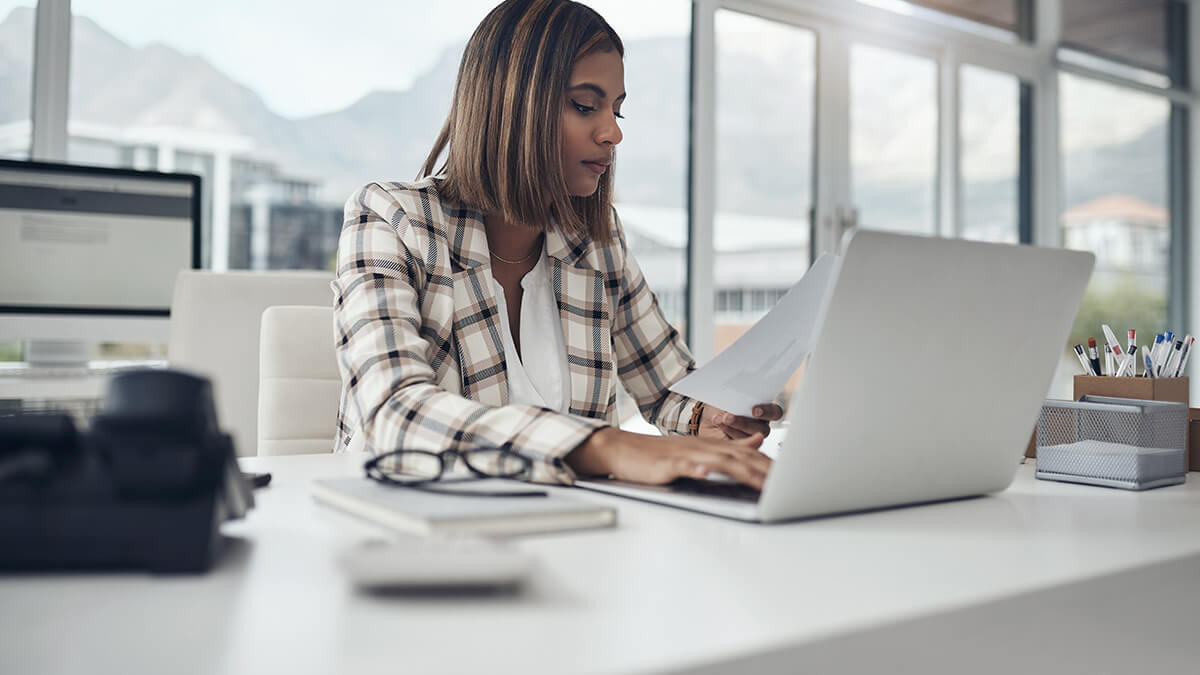 Woman deciding if she should e-file or paper file.