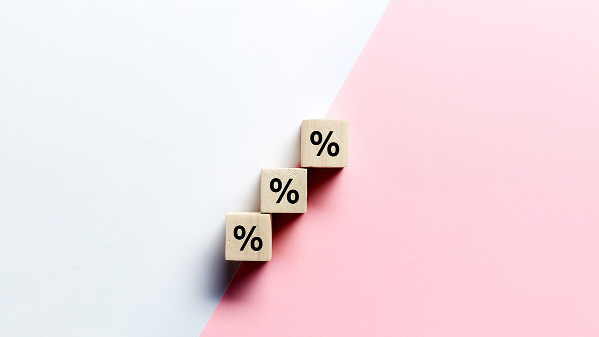 Three blocks with a percent symbol on them.
