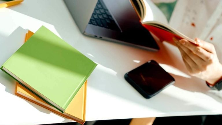 Binders on a desk.