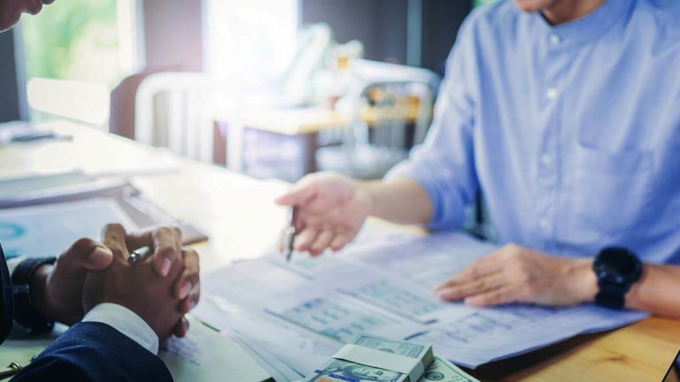 Two professionals having a conversation.