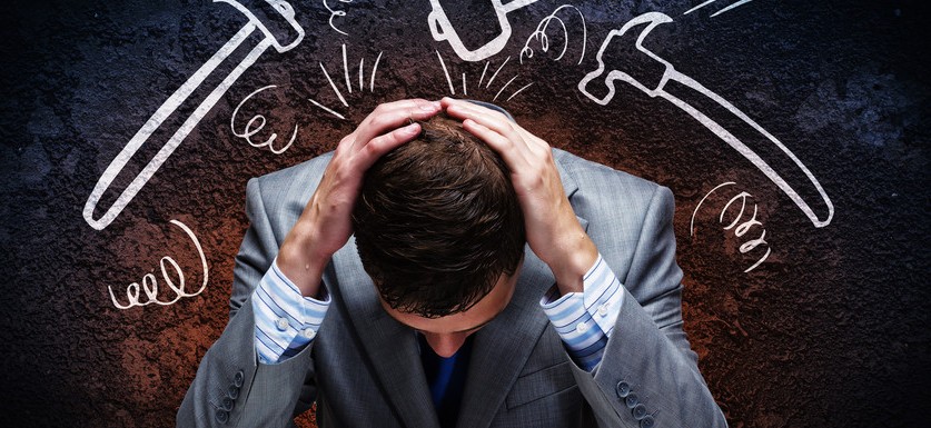 man who is stressed out due to wage violations