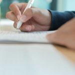 Employee filling out Form I-9.