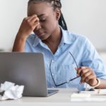 overwhelmed woman wondering what is my state unemployment tax rate