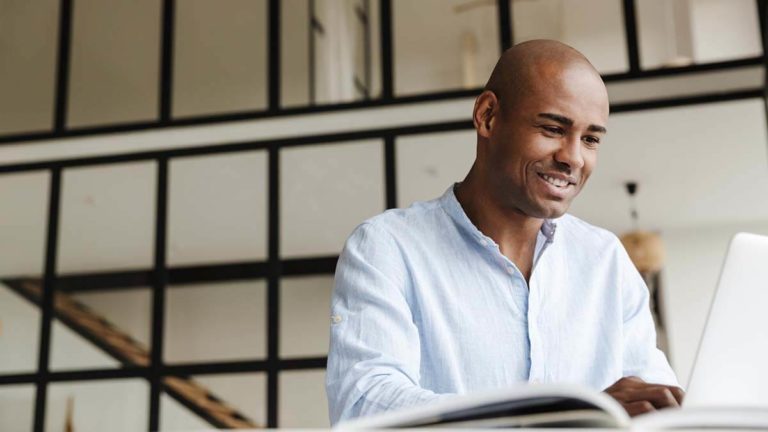 Man working at a desk.