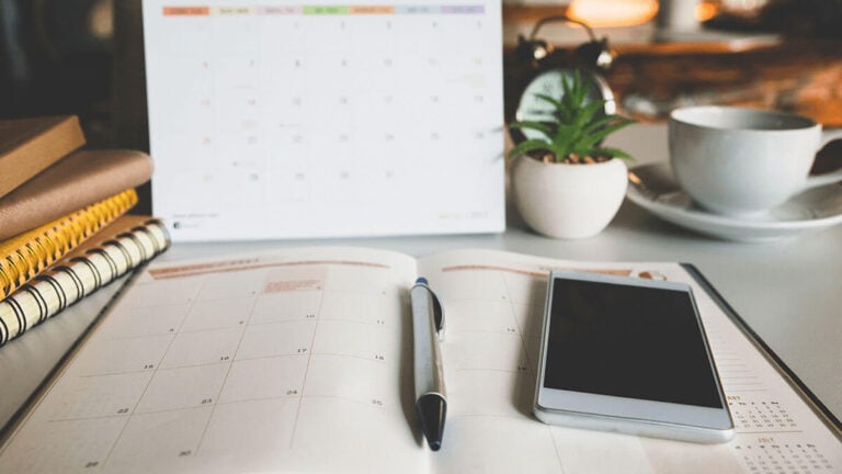 Calendar, pen, and phone.