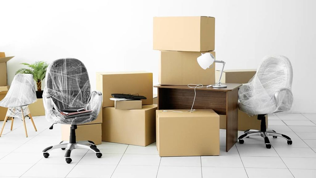 boxes and wrapped chairs during a business change of address