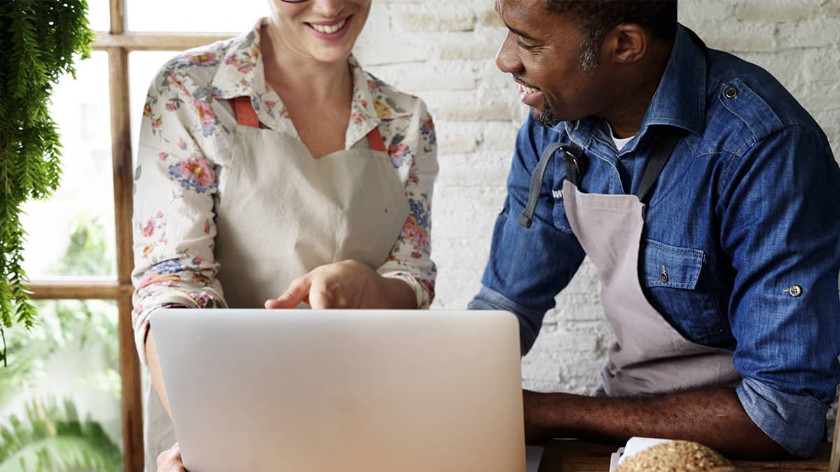 two business partners discussing a project together