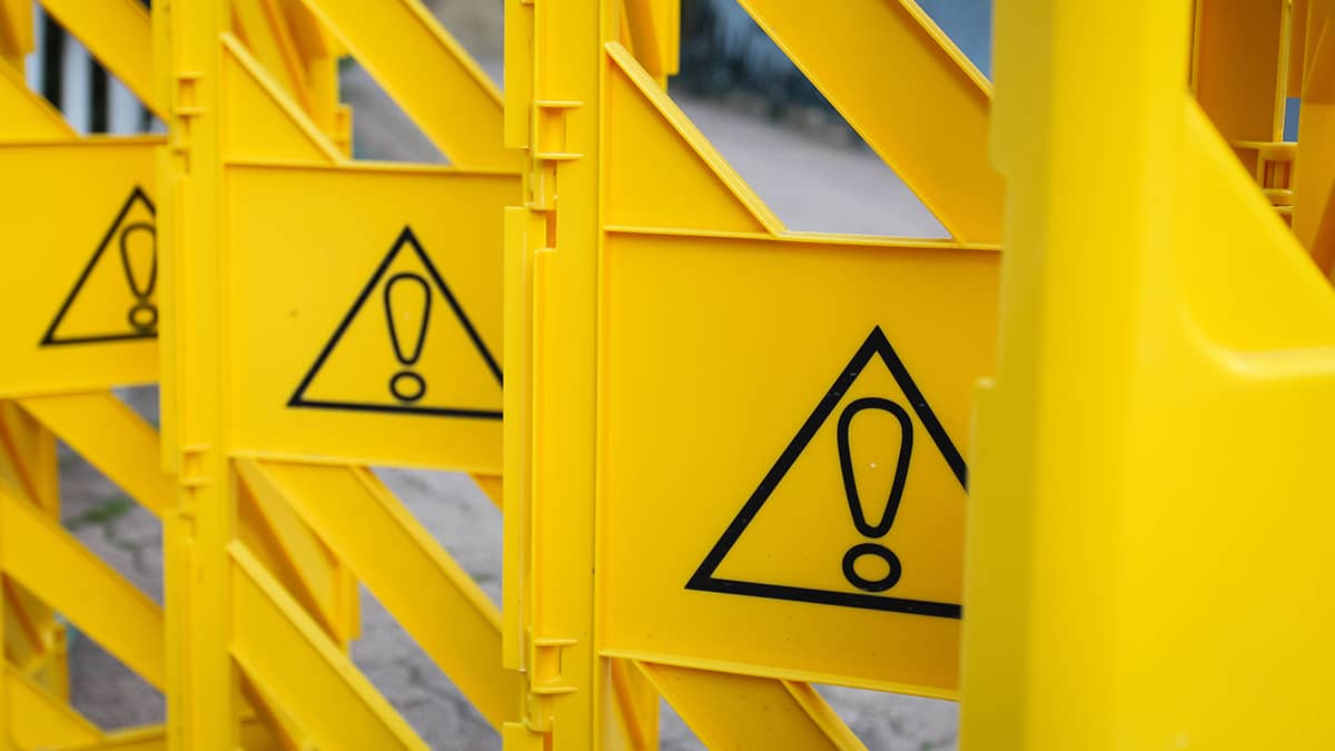 yellow caution and warning signs