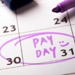 payroll calendar with the words 'pay day' written and circled