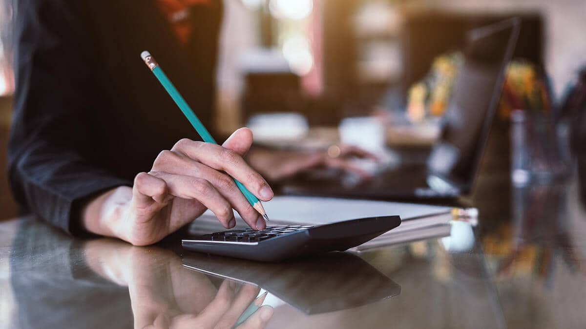 Business owner using a calculator.