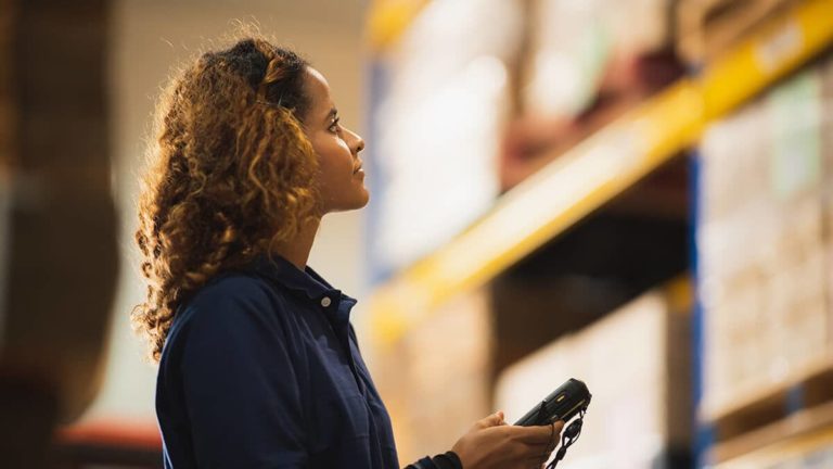 Woman working in a warehouse.