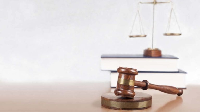 Gavel and legal books.