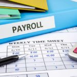 Payroll binder and time sheets.