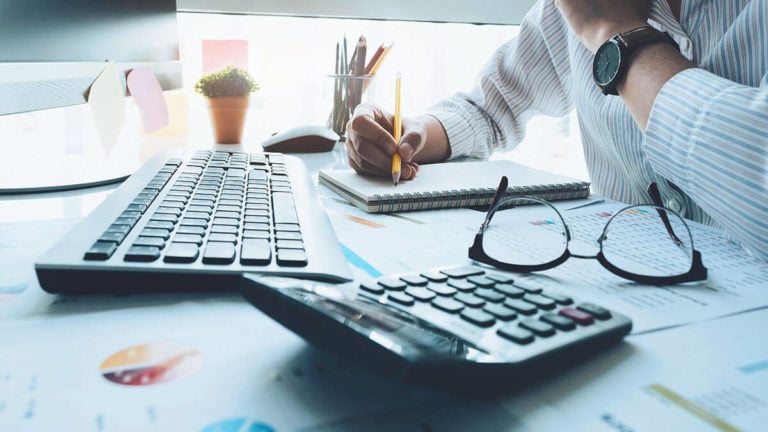 Business owner handing bookkeeping.