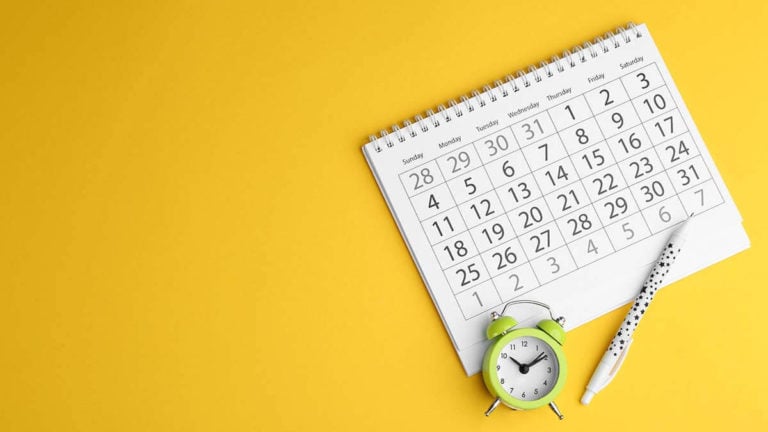 Calendar, alarm clock, and pen.