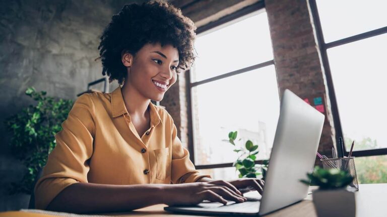 Woman looking up electronic labor law posters.