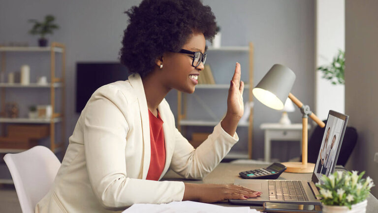 HR professional on a virtual call with remote employees.