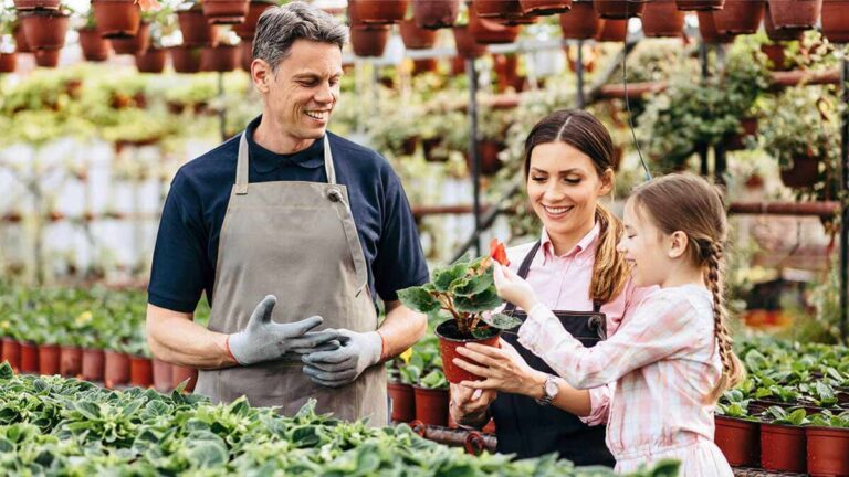 A family in a greenhouse.