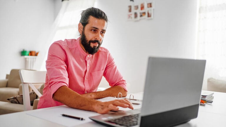 Man using his laptop.