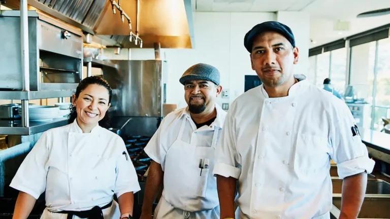 Three chefs in a kitchen