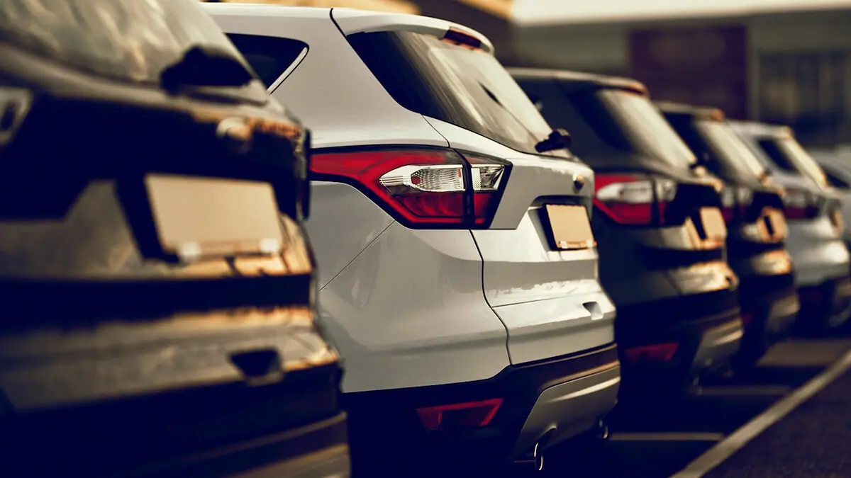 Cars in a parking lot.