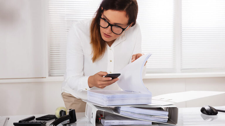 Worker committing employee fraud.