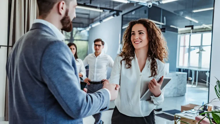 Man and woman shaking hands