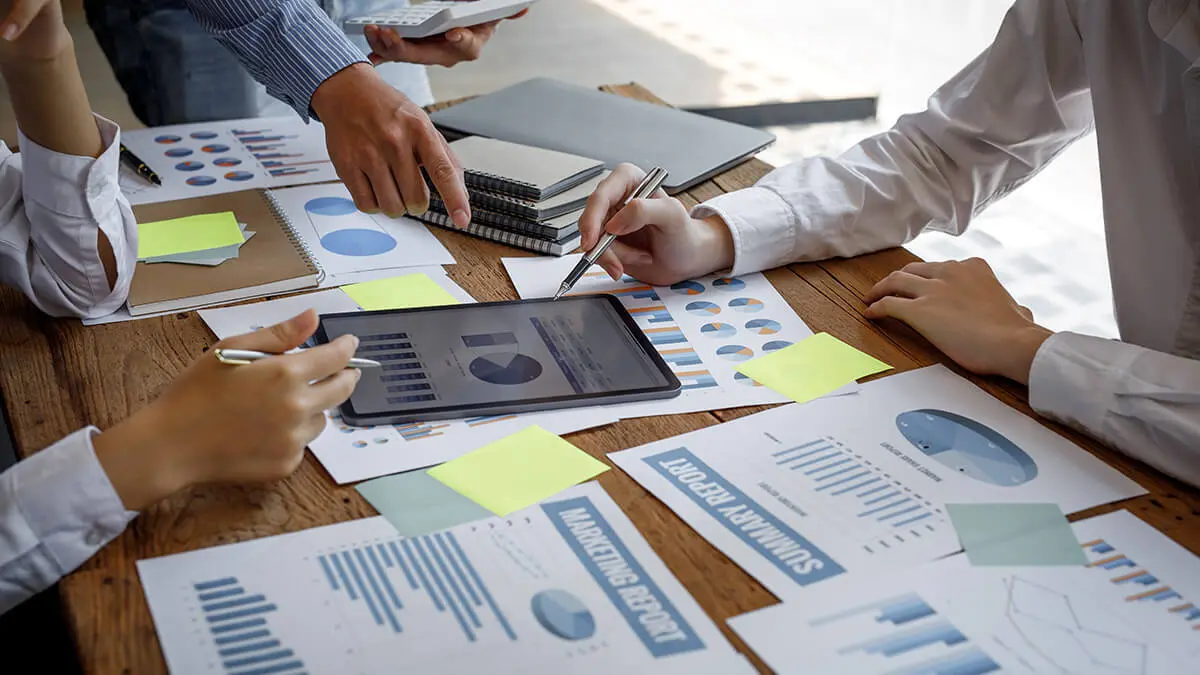 Team of employees who are doing financial reporting