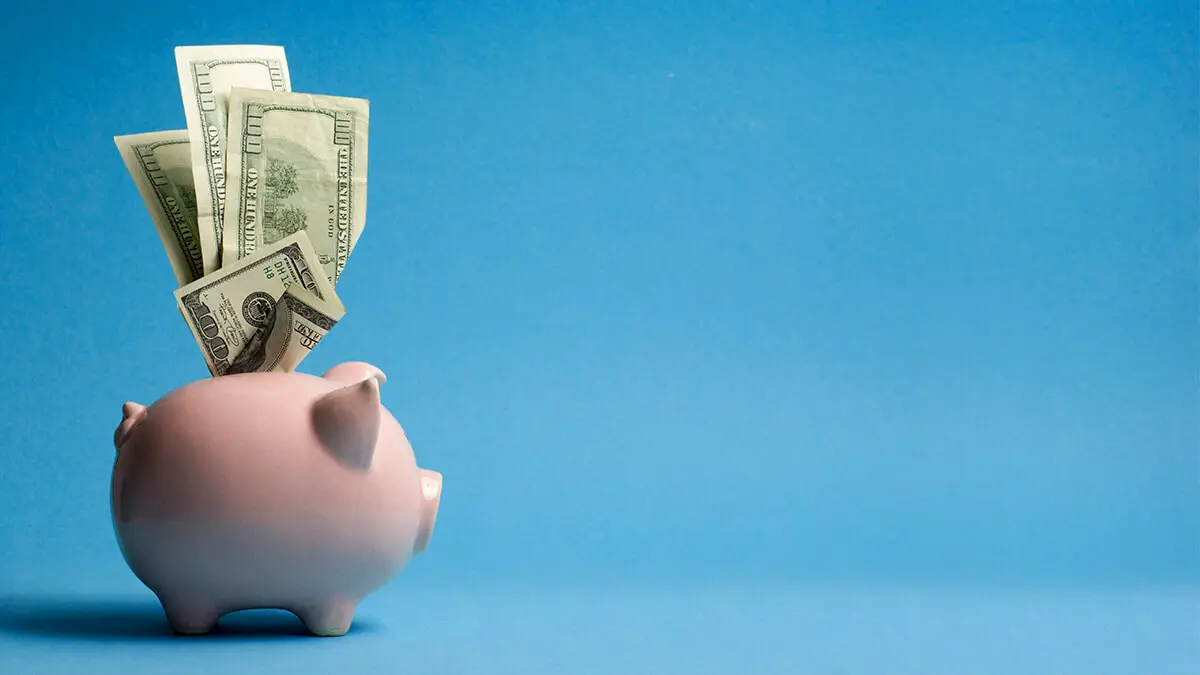 Piggy bank on a blue background