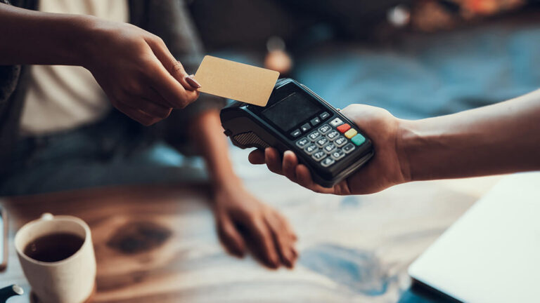 Customer paying with a credit card.