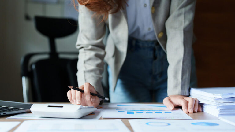 Woman auditing a business.