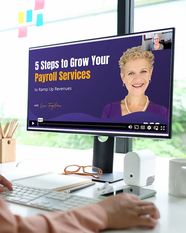 Accountant watching Loren Fogelman's "5 Steps to Grow Your Payroll Services" webinar on laptop.
