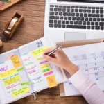 Employer filling out a calendar