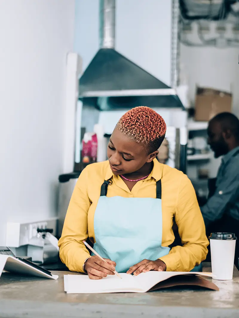 Businesswoman taking notes